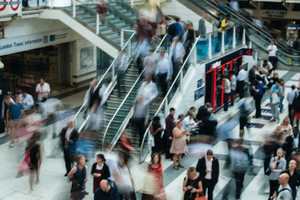 A crowd of people at a train station