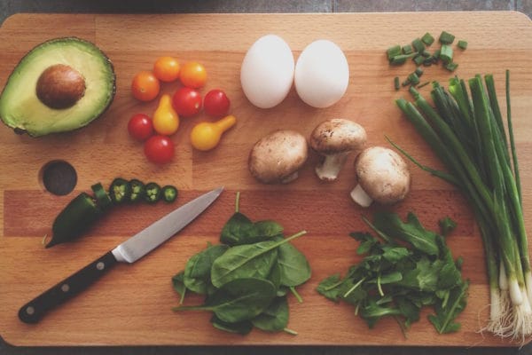 Food on a cutting board while it's prepared to be a healthy meal