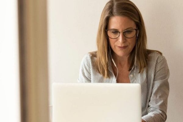 Woman Checking in laptop