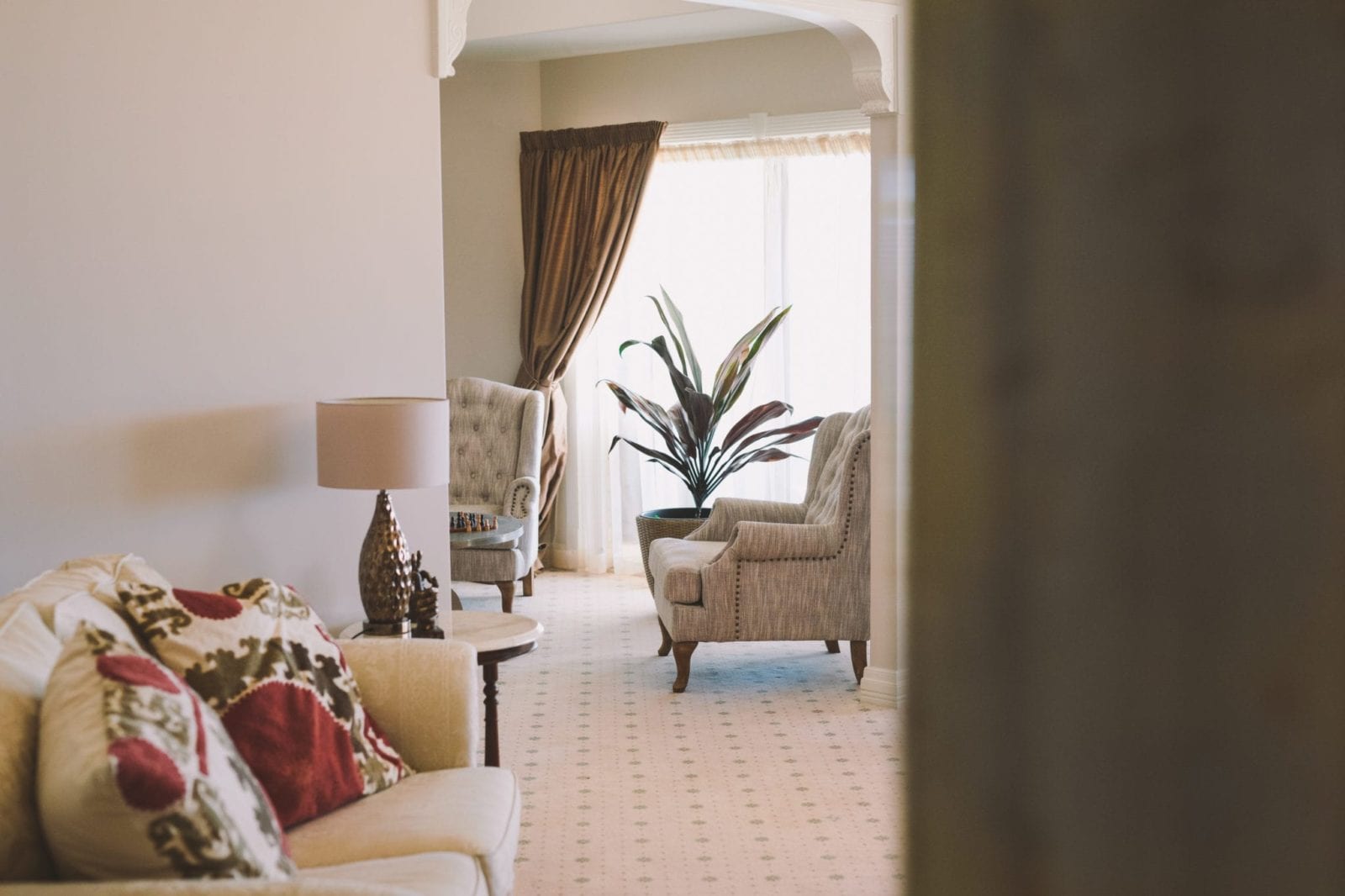 Big bedroom with soft chairs