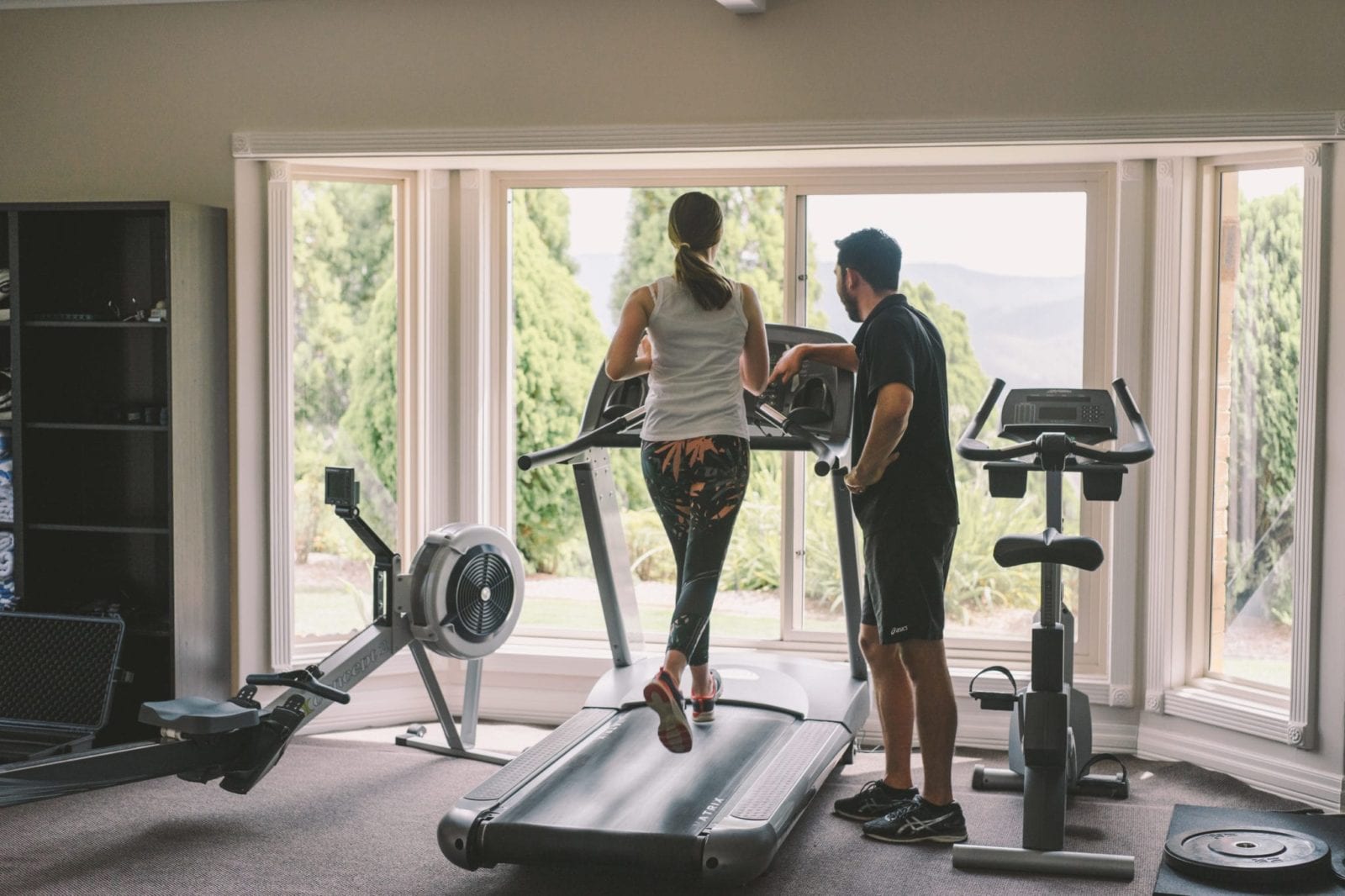 woman running on treadmill