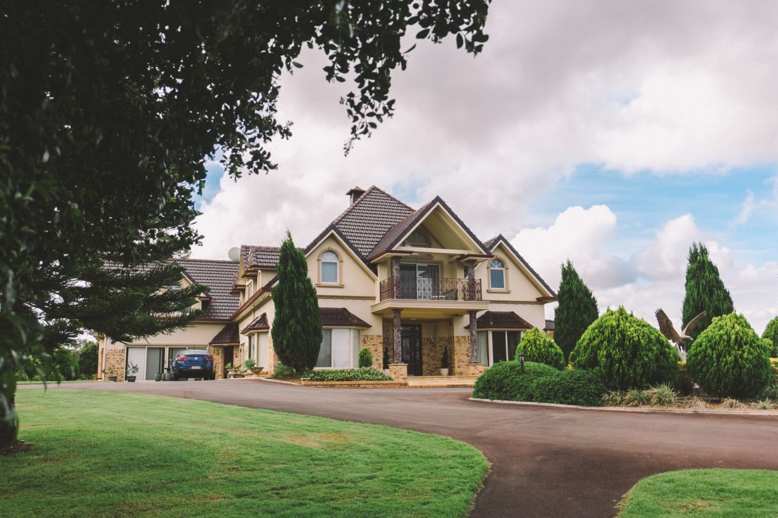 Big house with green grass