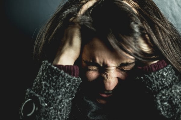 Woman feels unwell because she experiences anxiety