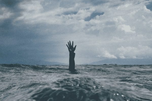 A hand coming out of the water