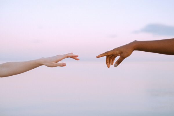 Image of hands holding signifying someone helping their loved one with an eating disorder