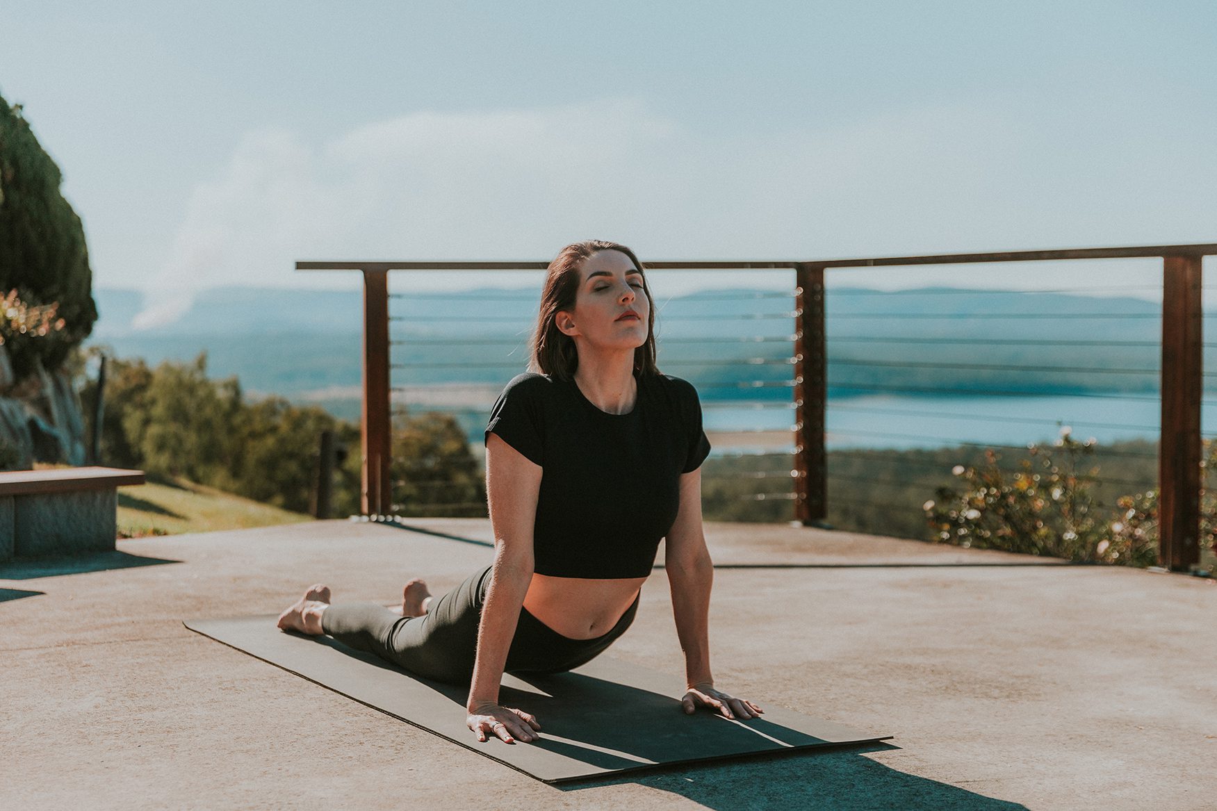 A guest doing Yoga at The Banyans