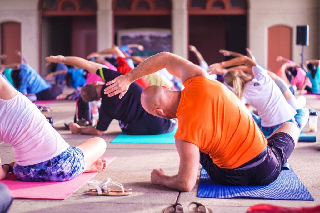 Man does yoga to relieve anxiety