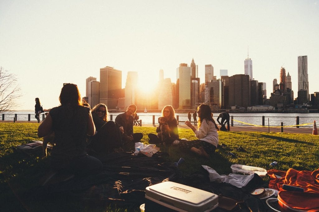 Friends have a picnic as they emerge from self-isolation