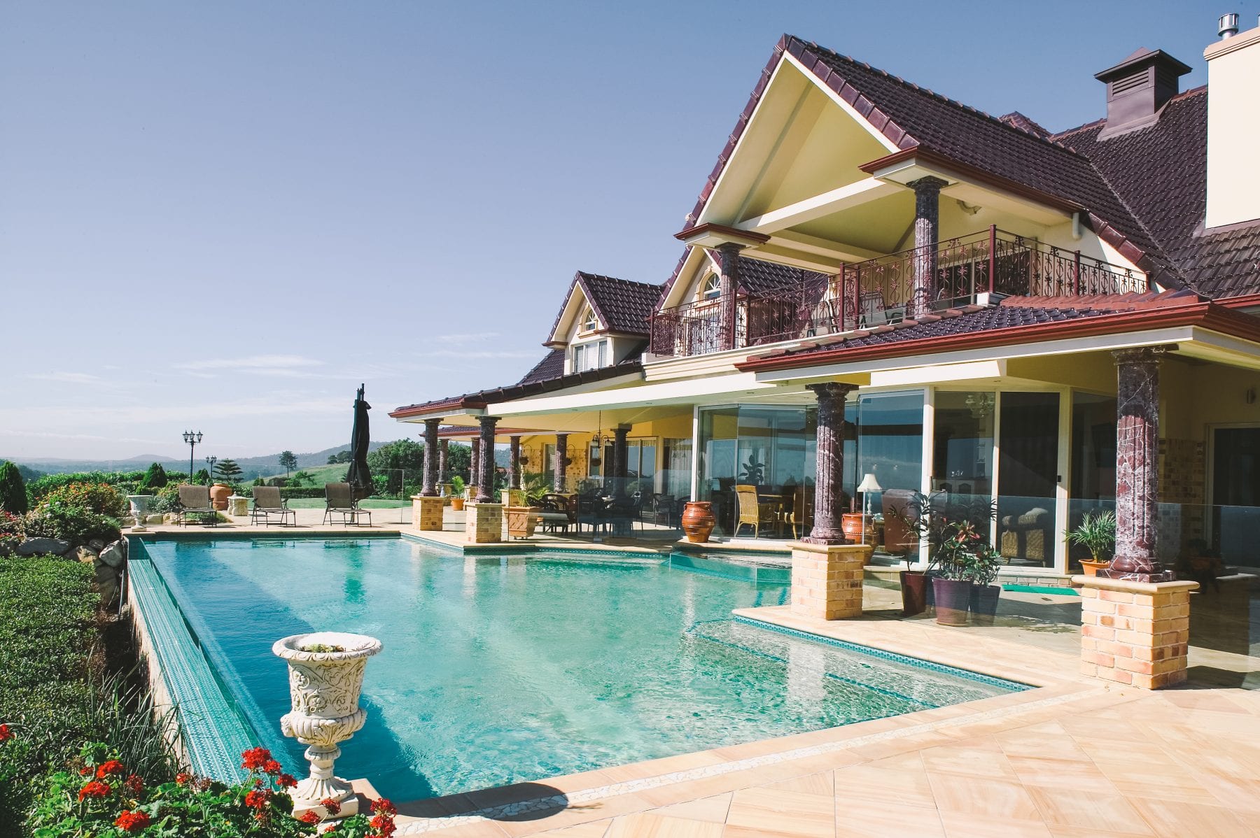 overlooking luxury pool and residence