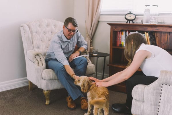 People petting dog
