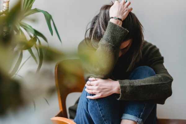 Woman suffering with anxiety from alcohol