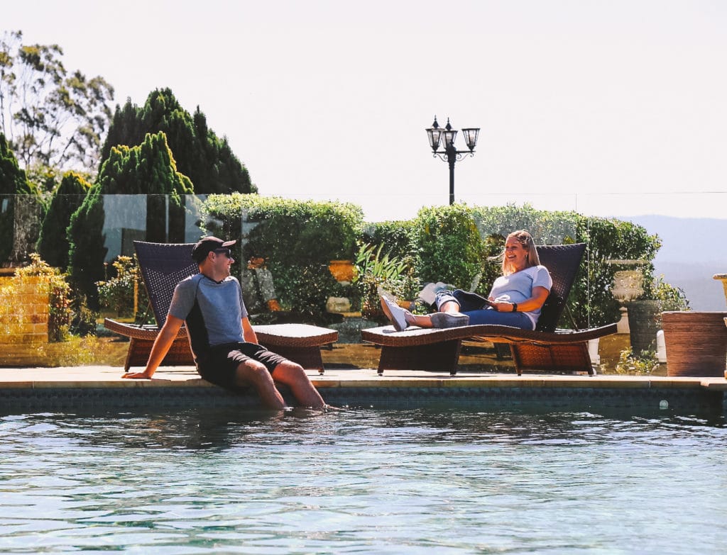 People connect by the pool at best rehab