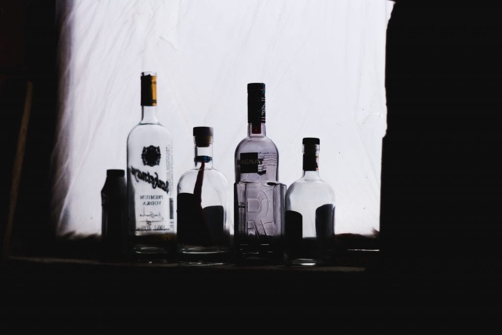 Empty bottles can indicate addiction or alcohol misuse.