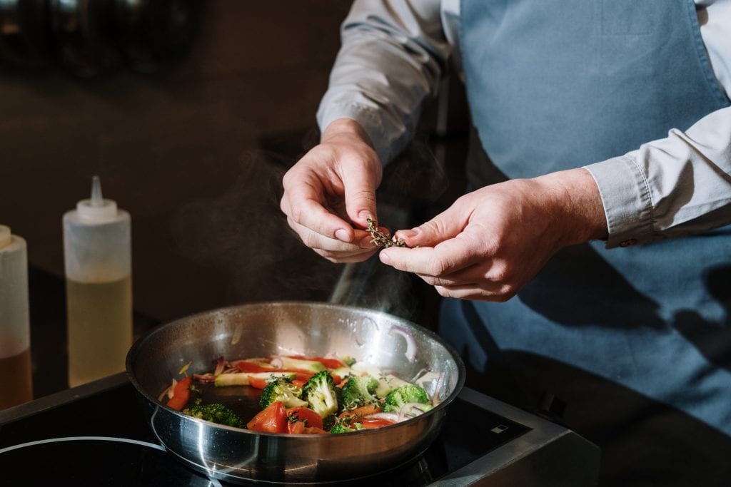 Man cooking a healthy dinner.