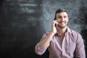 Man talking on the phone to a friend